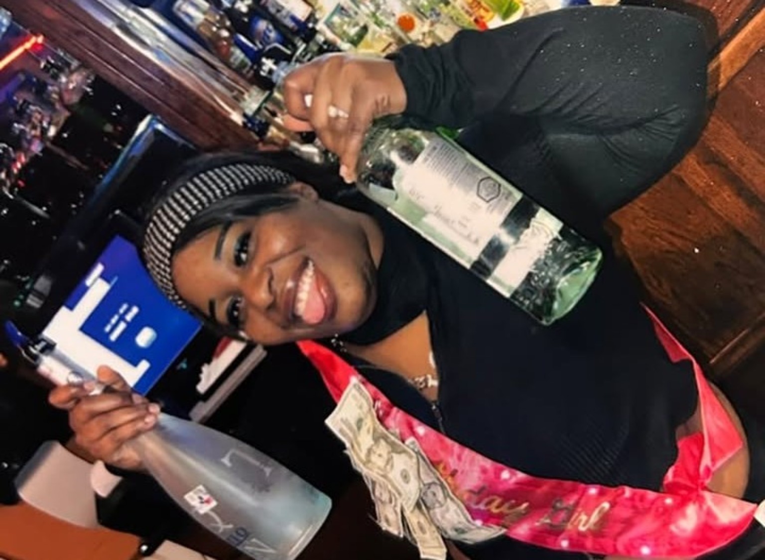 Kiki of Houston Sip Queen working behind the bar
